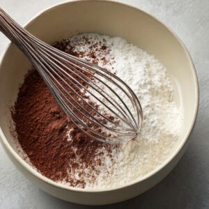 Bake at 350°F for 25-28 minutes. Insert a toothpick to check for doneness—there should be moist crumbs, not wet batter.