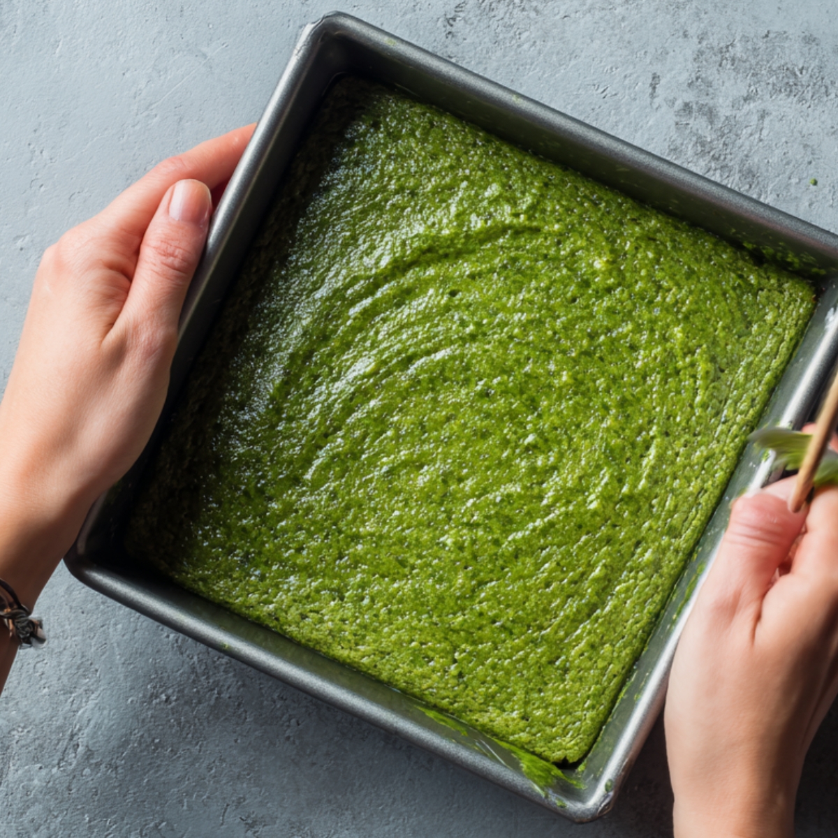 Beat the eggs and both sugars together until thick. Stir in the spinach puree, followed by melted chocolate chips. Add vanilla extract and mix well