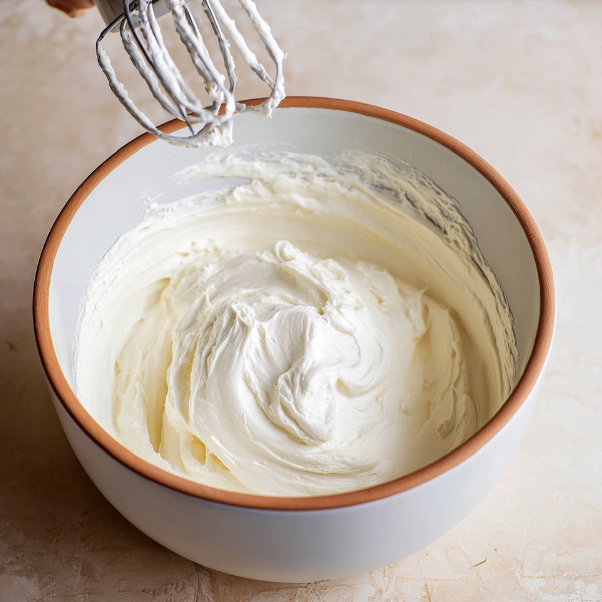 Japanese Fruit Sandwich Recipe (Ready in 10 Minutes!) 10 "A fluffy bowl of whipped cream, perfectly whipped to soft peaks, ready to be used for desserts or fruit sandwiches."