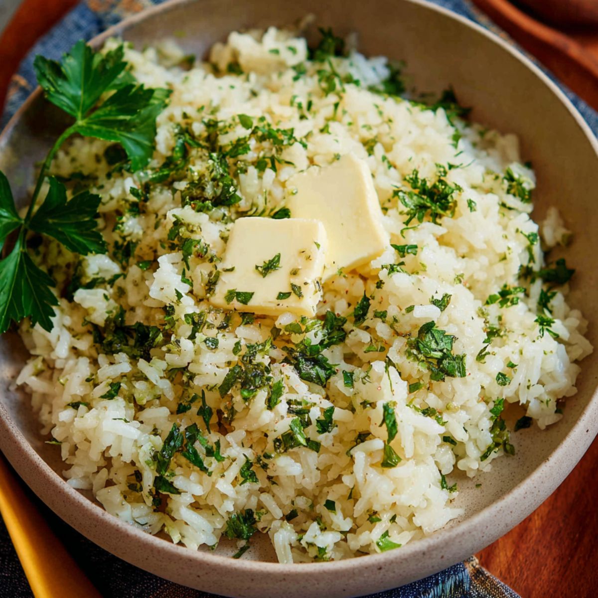 Healthy Garlic Butter Rice Recipe 9 Garlic Butter Rice The finished garlic butter rice, garnished with fresh parsley and a pat of butter on top.