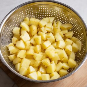 Healthy Southern Potato Salad Recipe 15 Cooked and tender potatoes ready to be tossed into a flavorful potato salad, cut into bite-sized pieces.